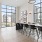 coworking space with a large table seating and windows