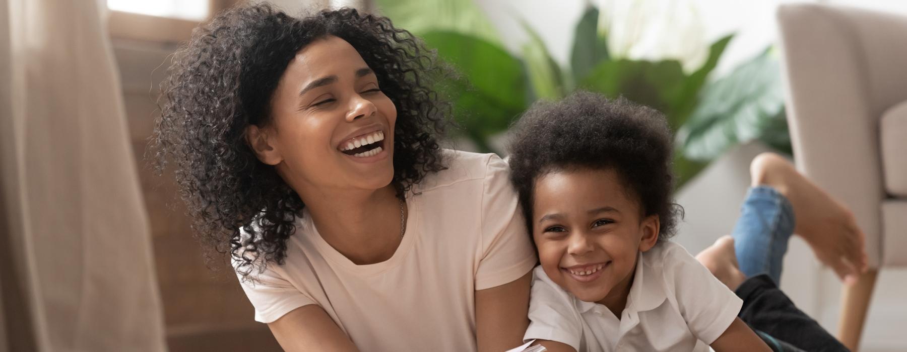 a person and a child reading a book